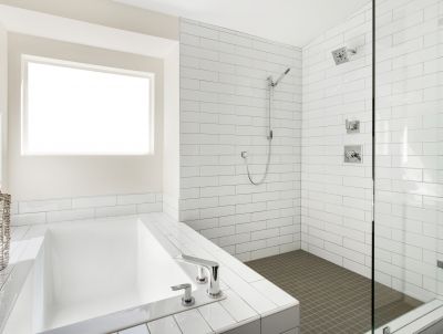 Sleek Shower with Vertical Tile Pattern